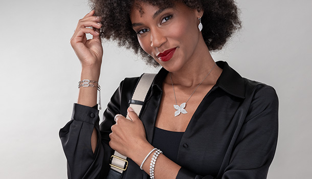Woman wearing rhodium and crystal jewelry
